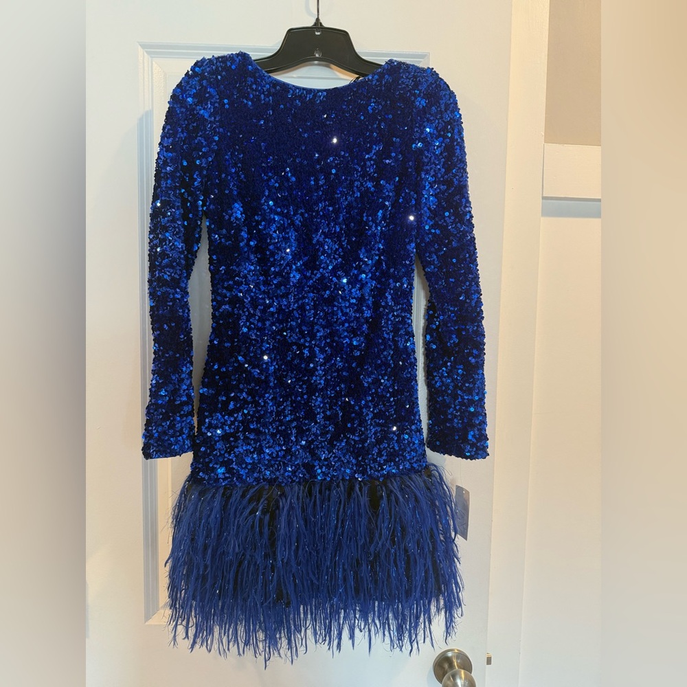 SHO by Tadashi Shoji's sequined body-con dress embellished hem.